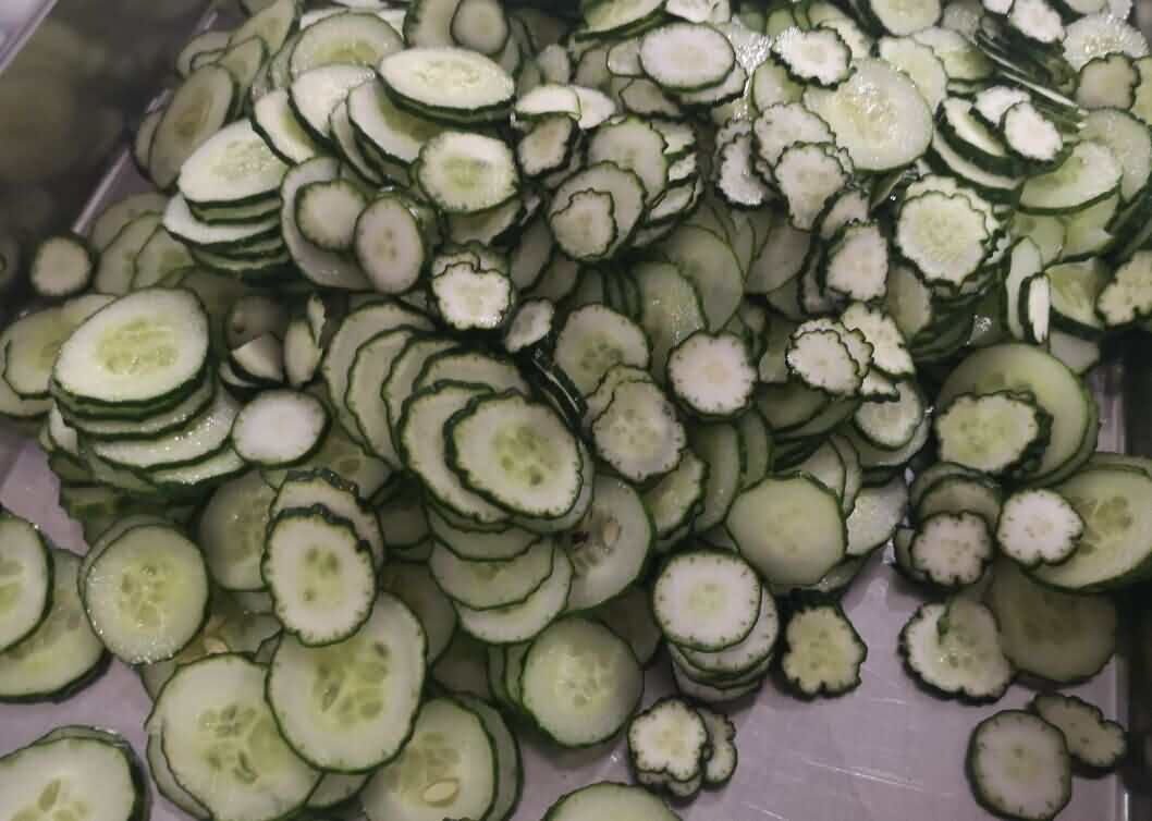 熟肉切片機(jī)一次切黃瓜片效果 熟肉切片機(jī)一次切黃瓜片效果